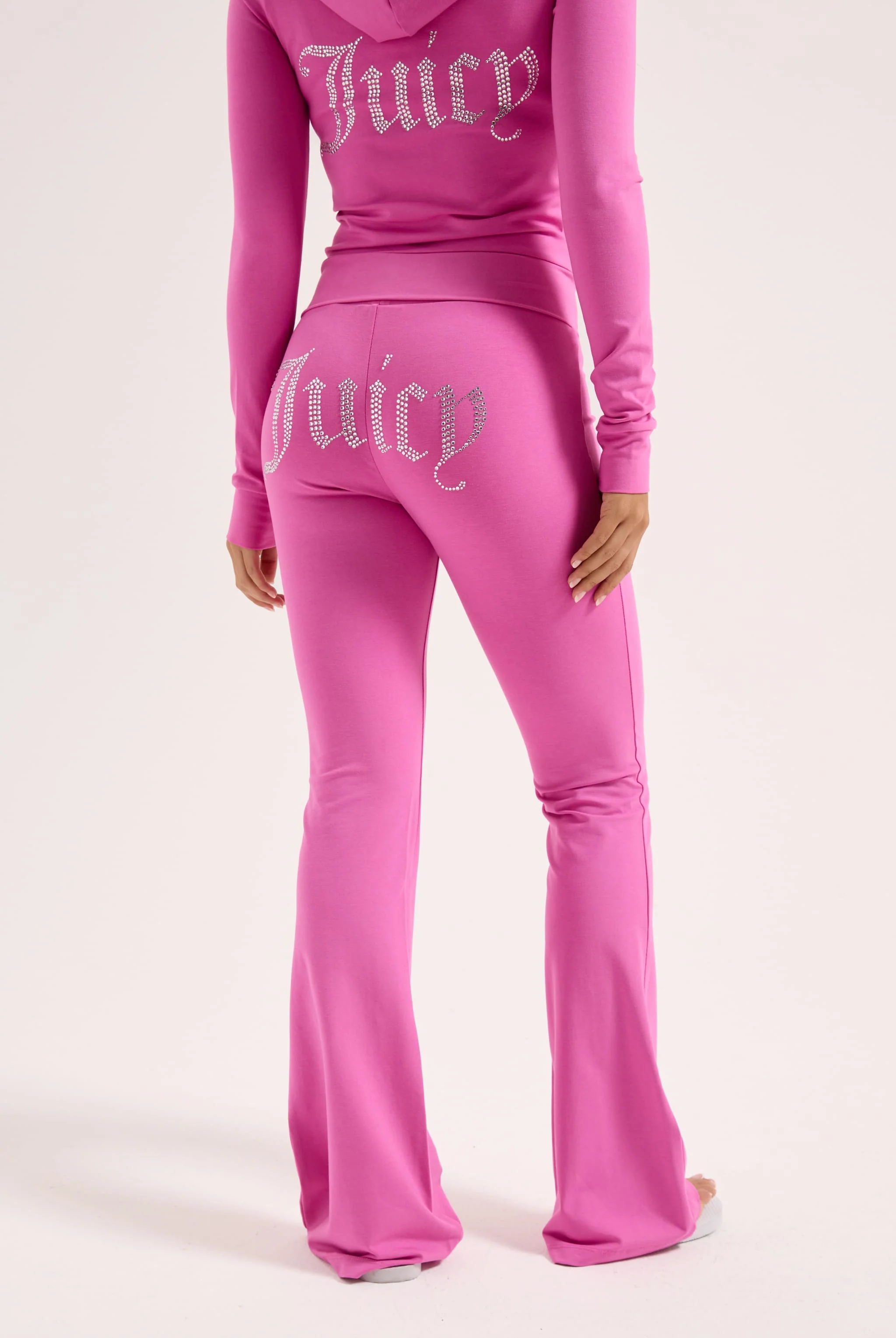 Pantaloni Christine a vita bassa e gamba a zampa in jersey con logo Juicy in strass colore Rosa - Image 7