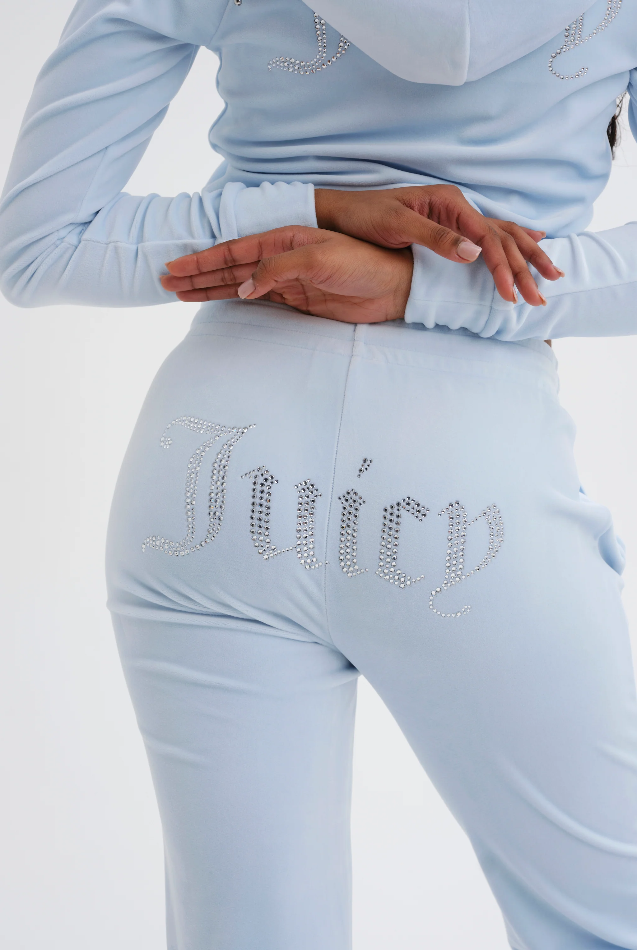 Pantaloni Tina Celeste con maxi logo strass - Image 4
